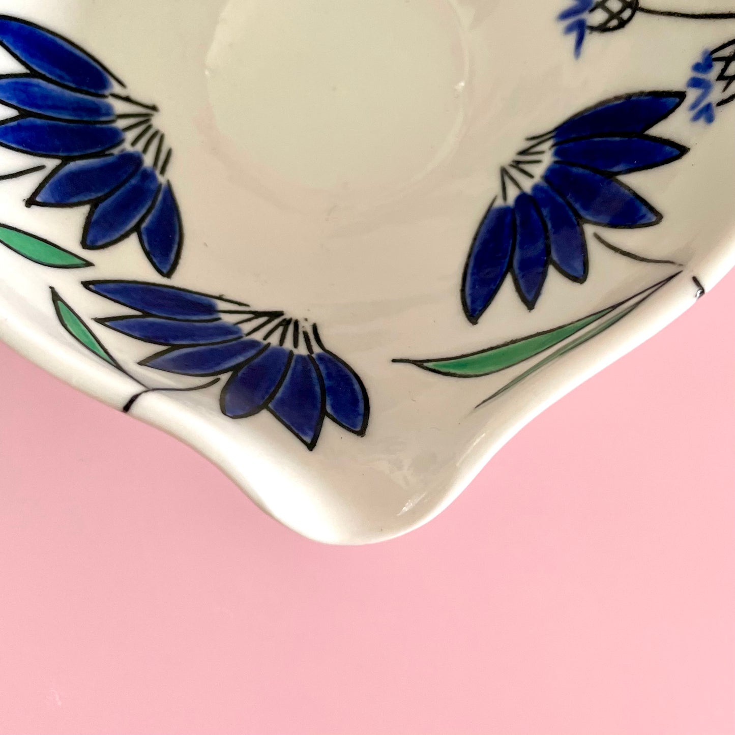 Small porcelain pouring bowl with blue coneflower design