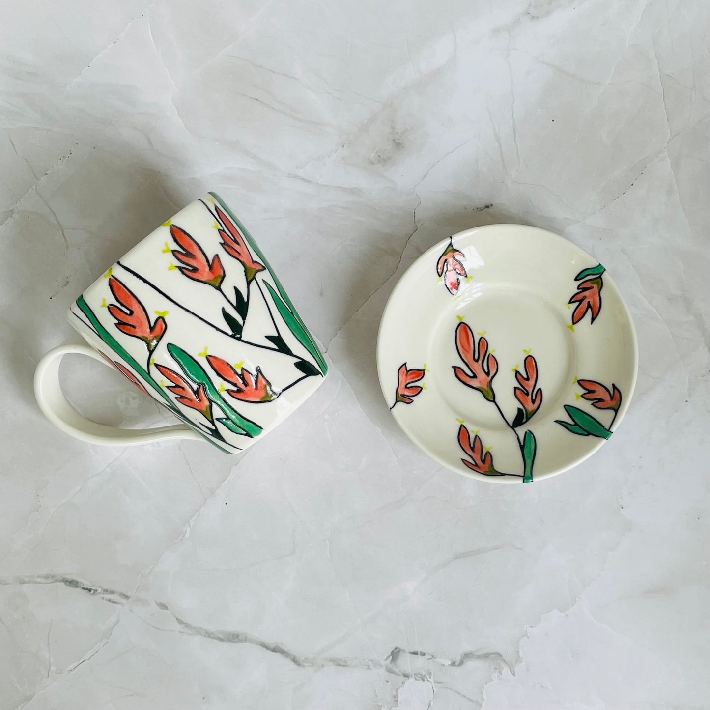 #5: Small cup & saucer set - pink kangaroo paw design