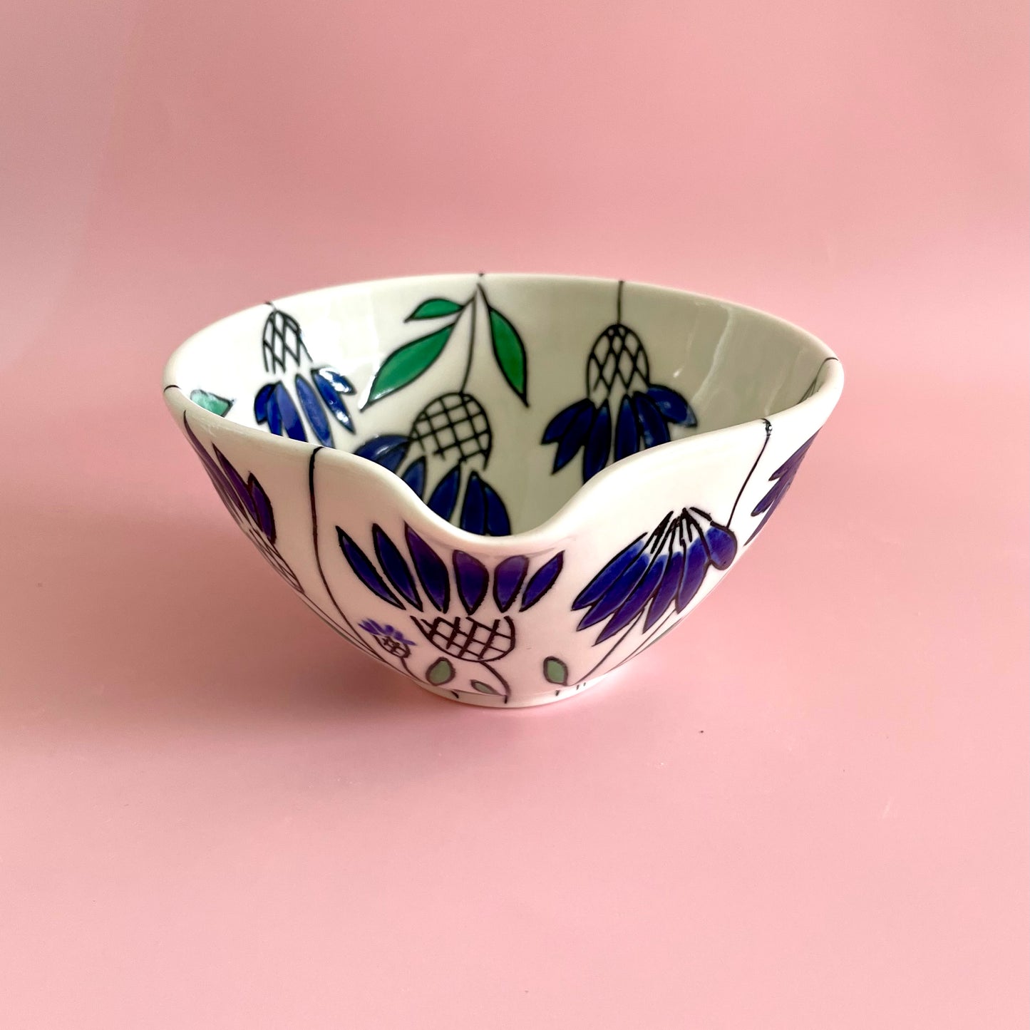 Small porcelain pouring bowl with blue coneflower design