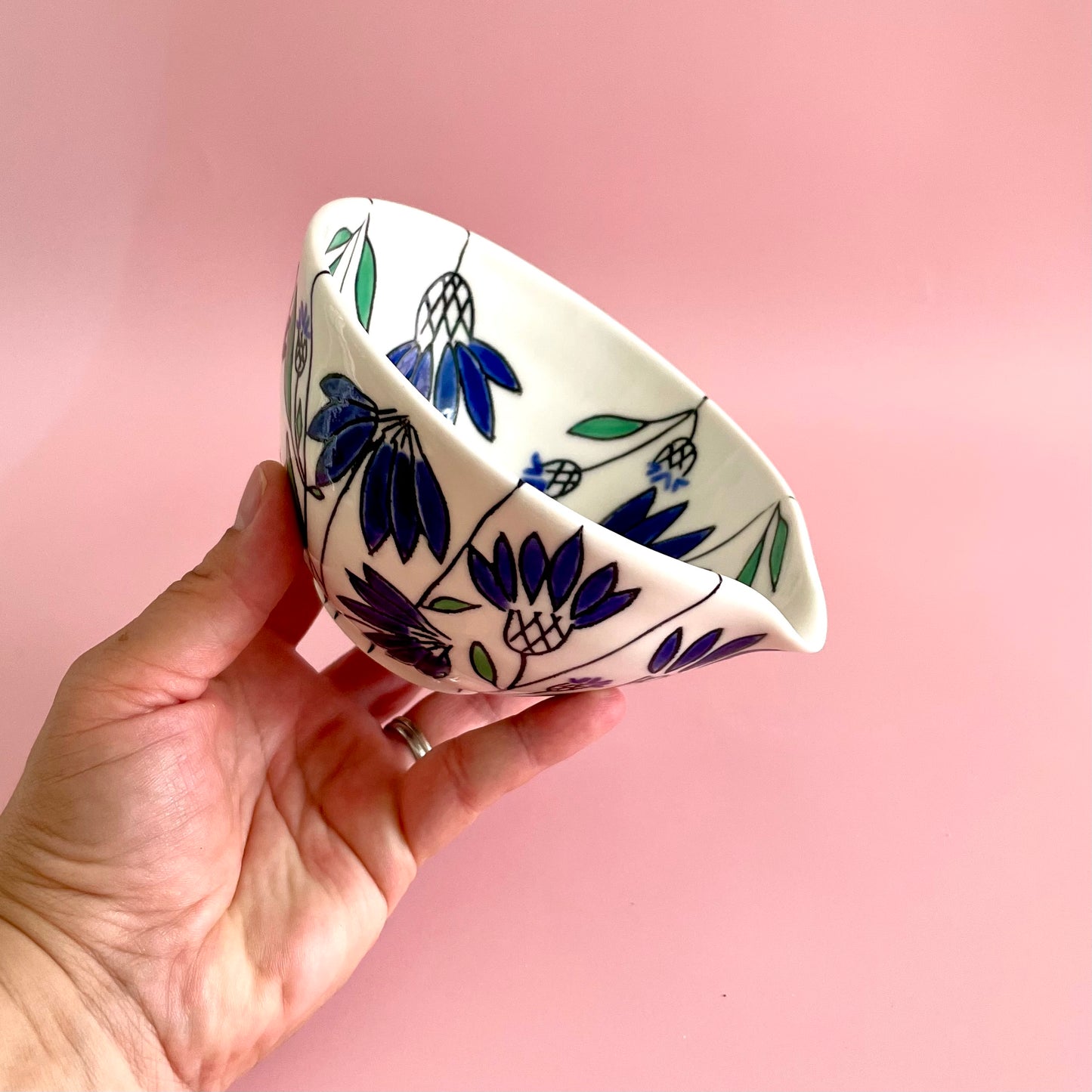 Small porcelain pouring bowl with blue coneflower design