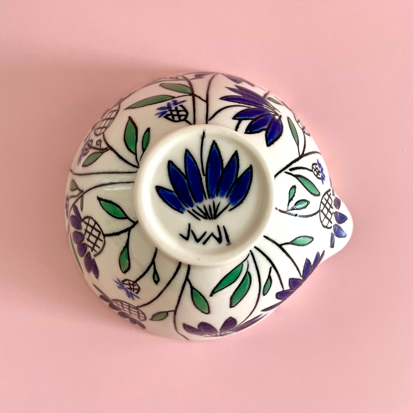 Small porcelain pouring bowl with blue coneflower design