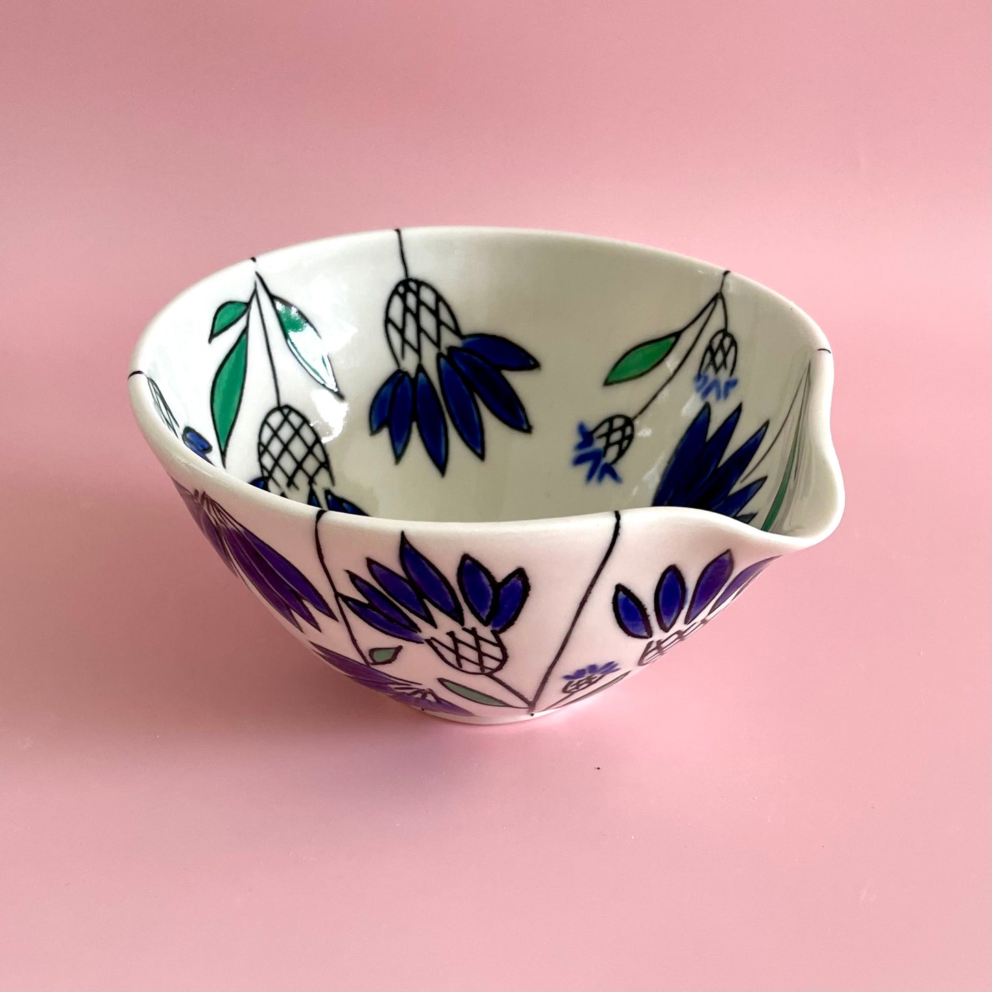 Small porcelain pouring bowl with blue coneflower design