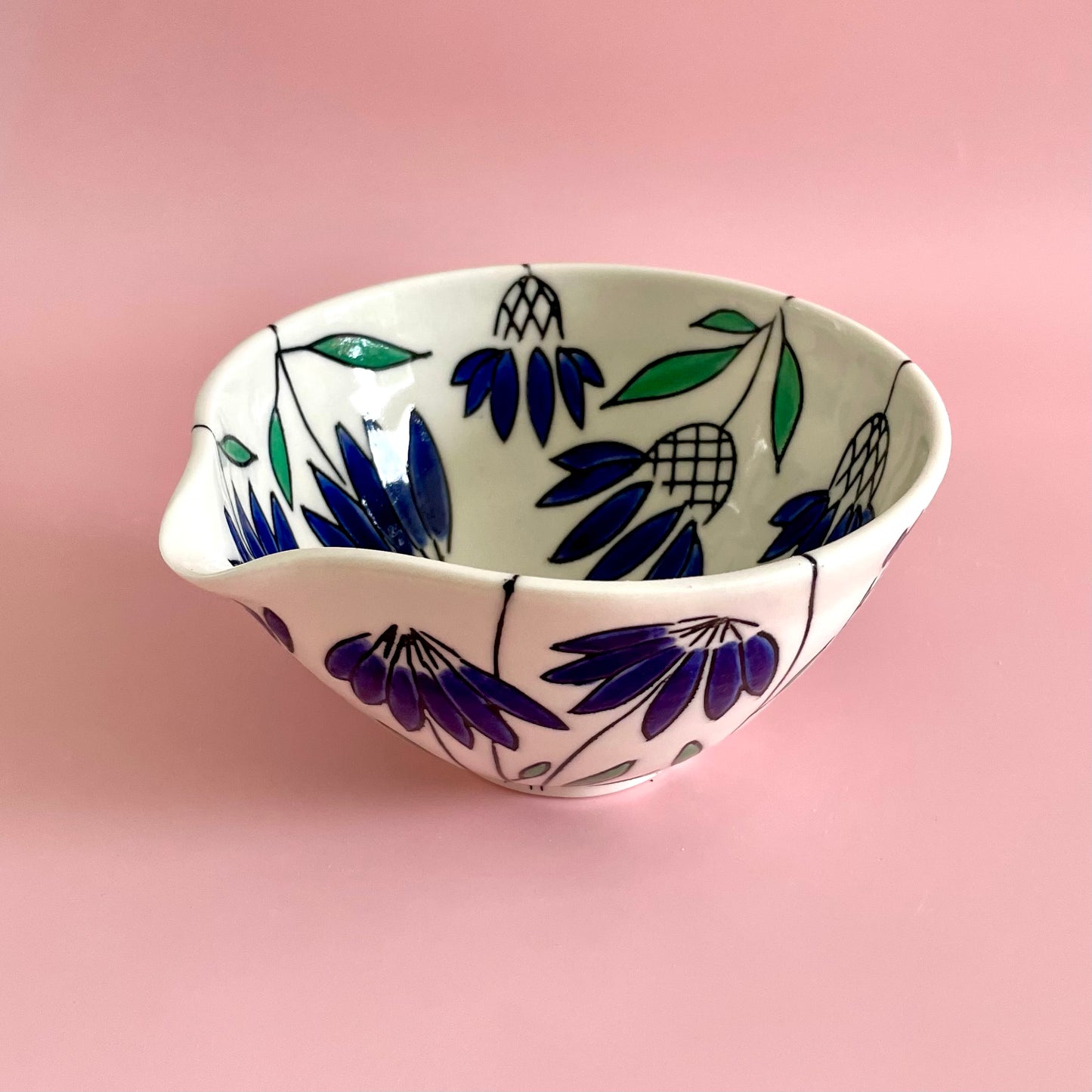 Small porcelain pouring bowl with blue coneflower design