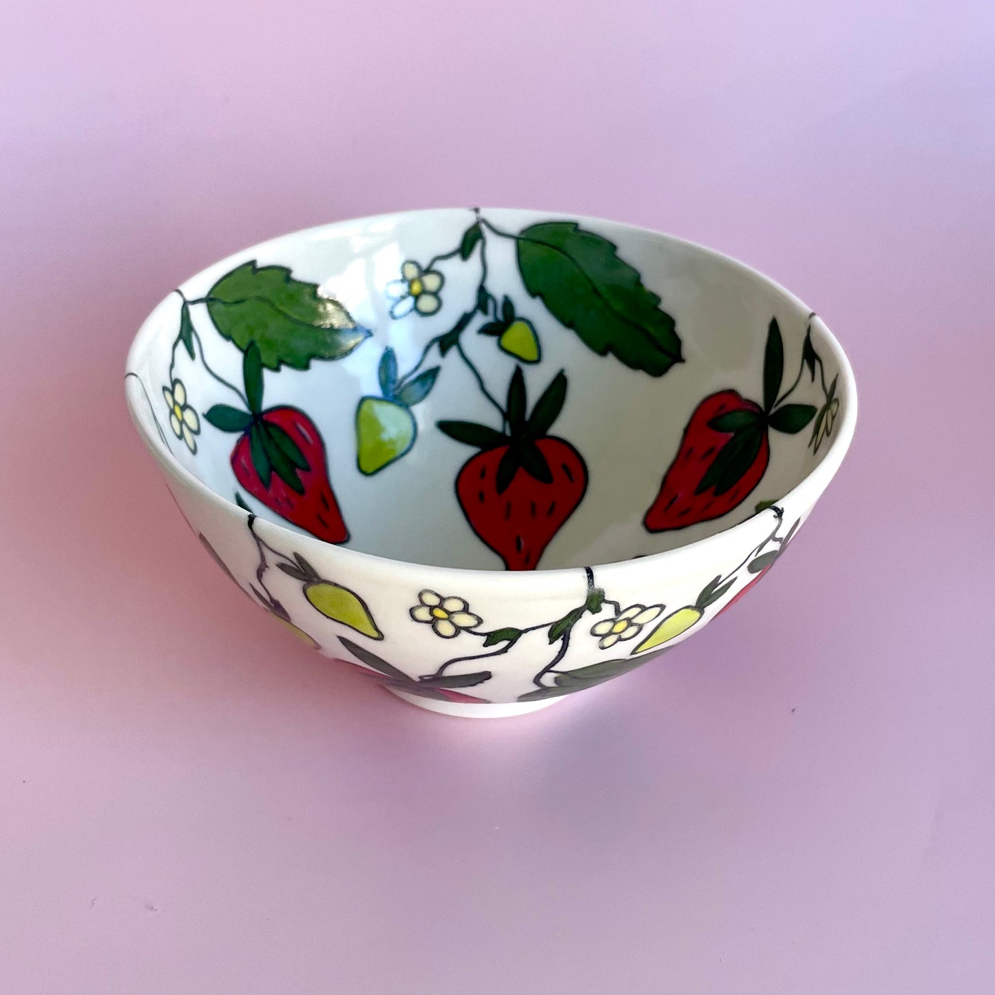 Small porcelain bowl with strawberry design