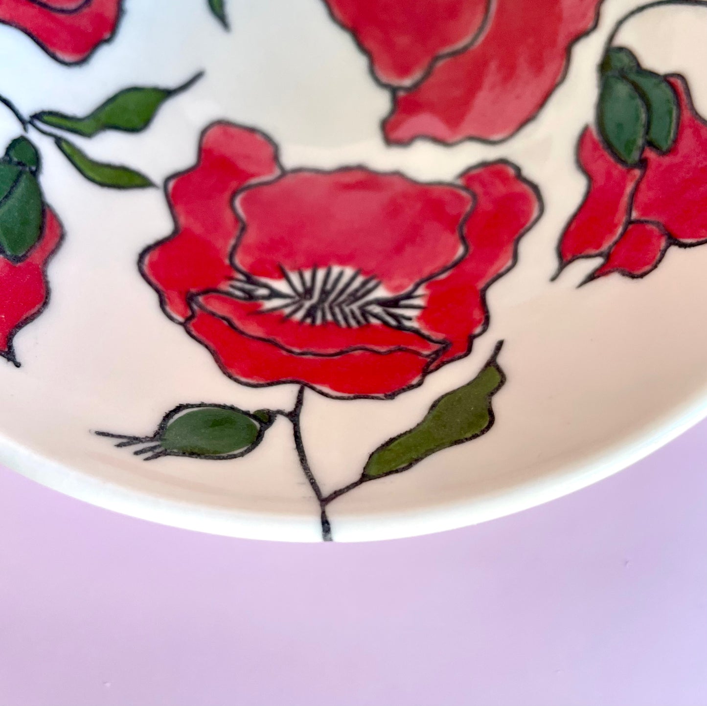 Small porcelain bowl with red poppies