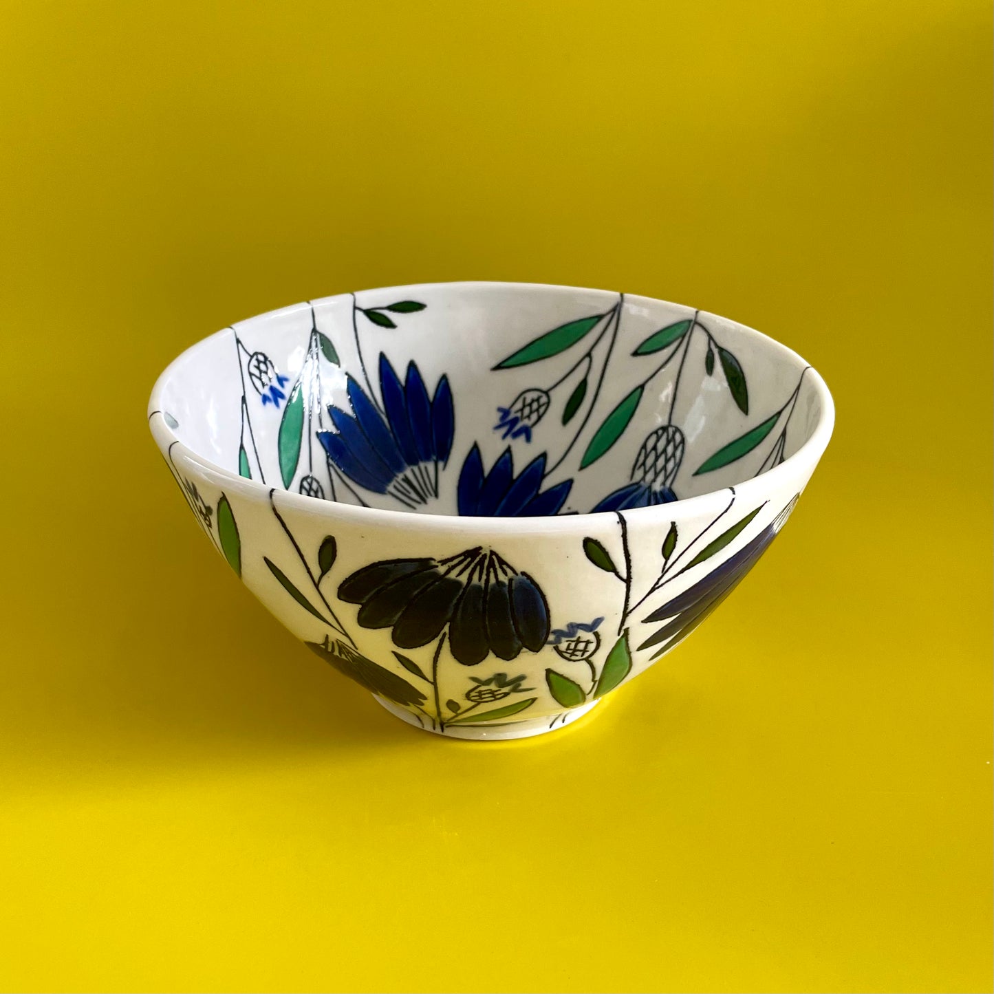 Medium porcelain bowl with blue coneflowers