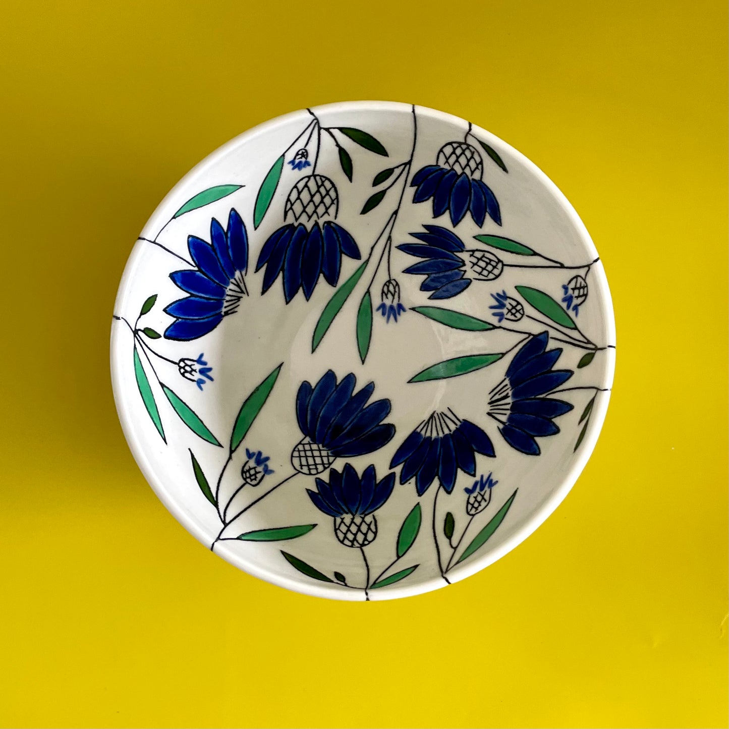 Medium porcelain bowl with blue coneflowers