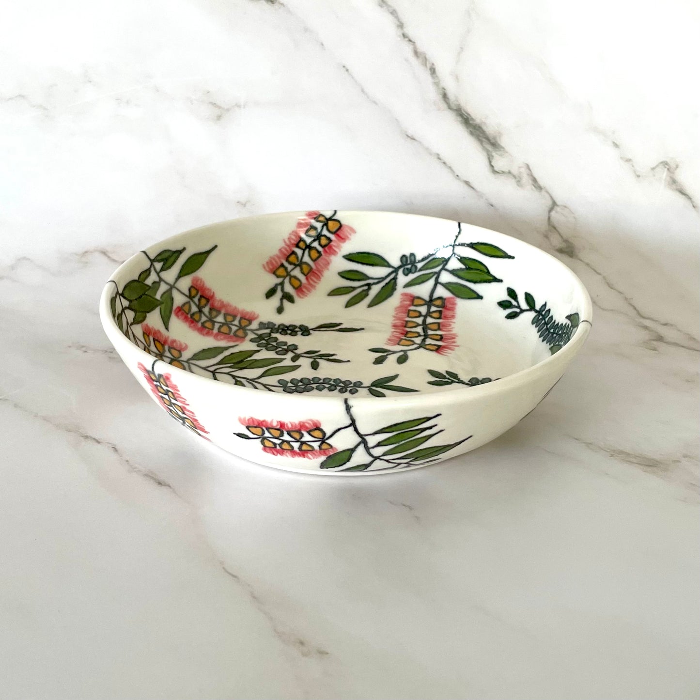 Small porcelain coupe bowl with native Australian bottlebrush