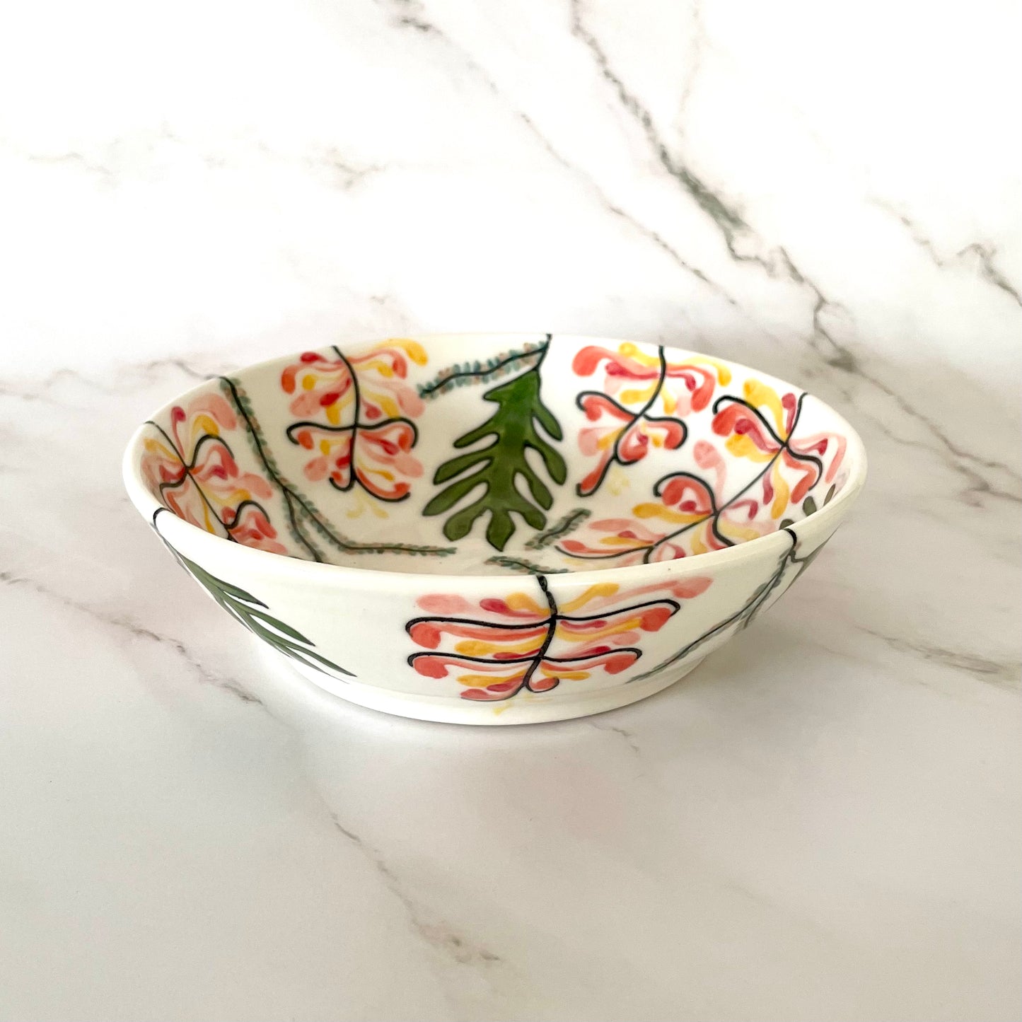 Small porcelain coupe bowl with native Australian grevilleas
