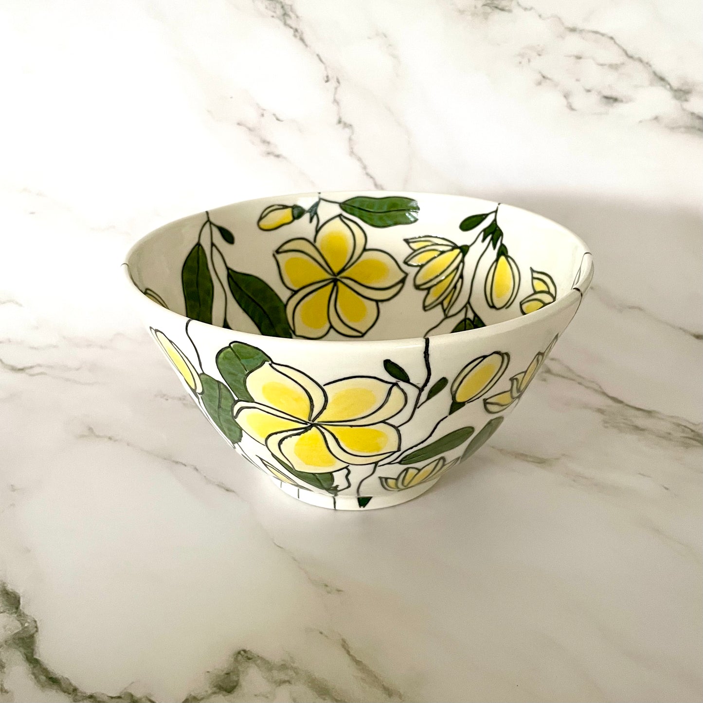 Large porcelain bowl with yellow frangipani (plumeria)