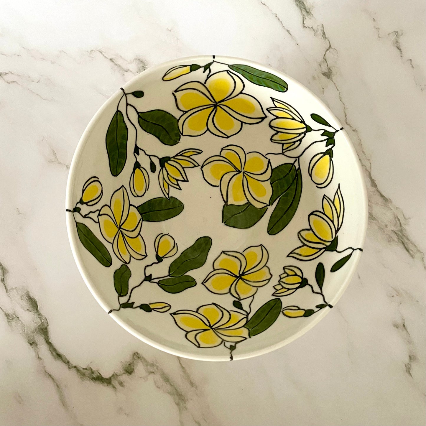 Large porcelain bowl with yellow frangipani (plumeria)