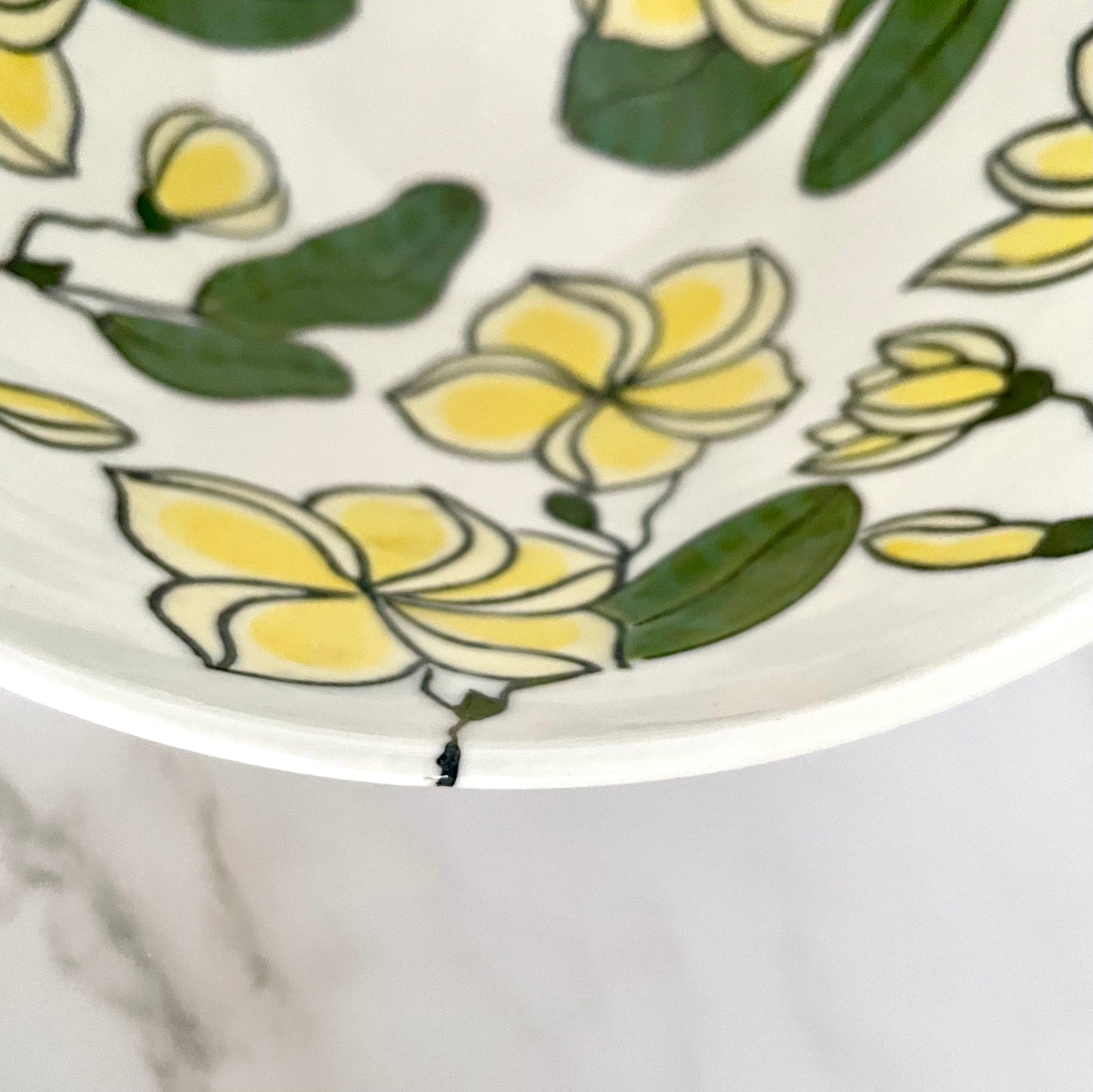 Large porcelain bowl with yellow frangipani (plumeria)