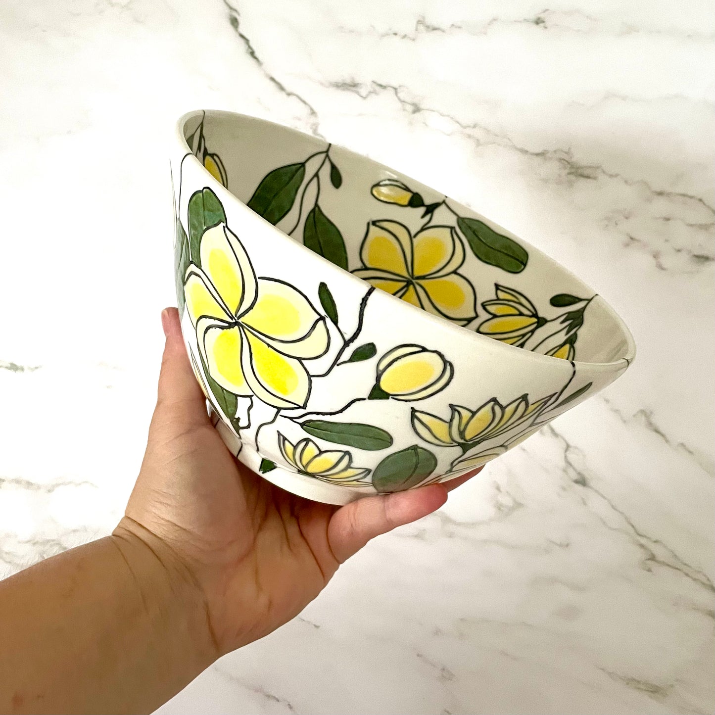 Large porcelain bowl with yellow frangipani (plumeria)