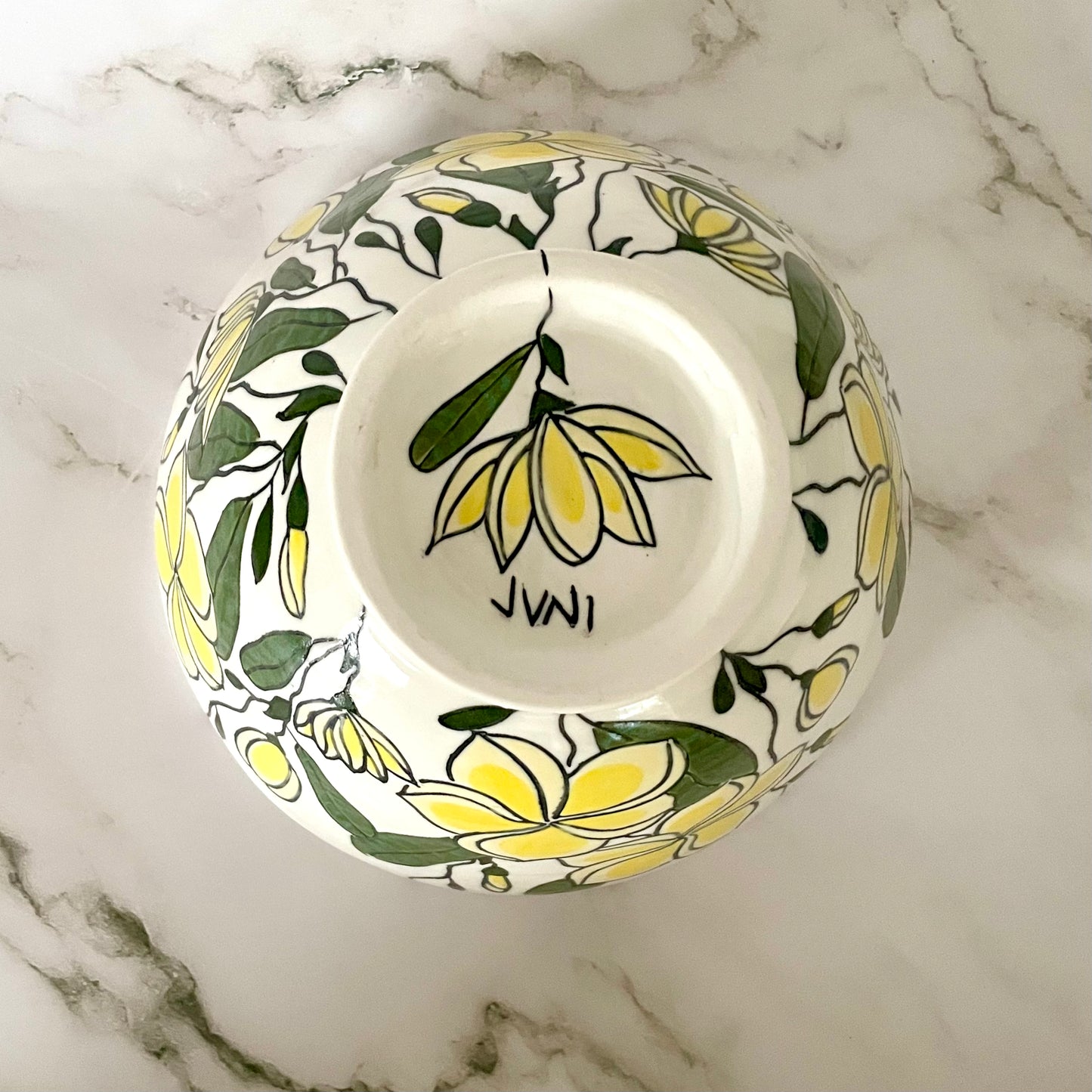 Large porcelain bowl with yellow frangipani (plumeria)